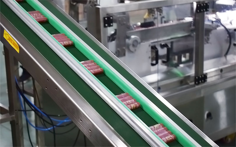 5号电池全自动理料装盒机前端连线传送带